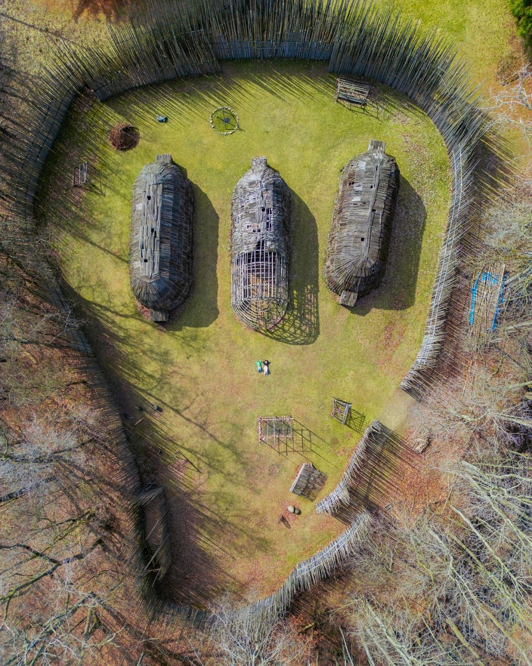 An aerial view of a re-creation longhouse village.